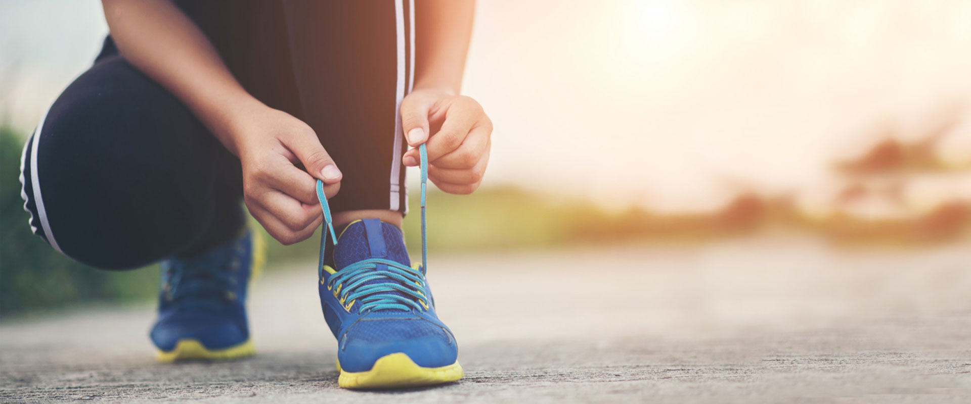 close-up-shoes-female-runner-tying-her-shoes-jogging-exercise